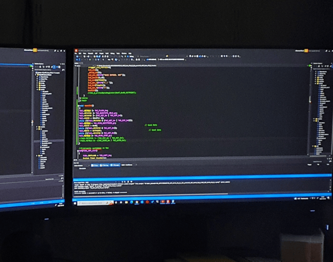 Engineering team working together on a hardware prototype
